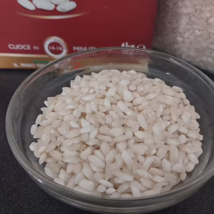 непромиті зернята рису